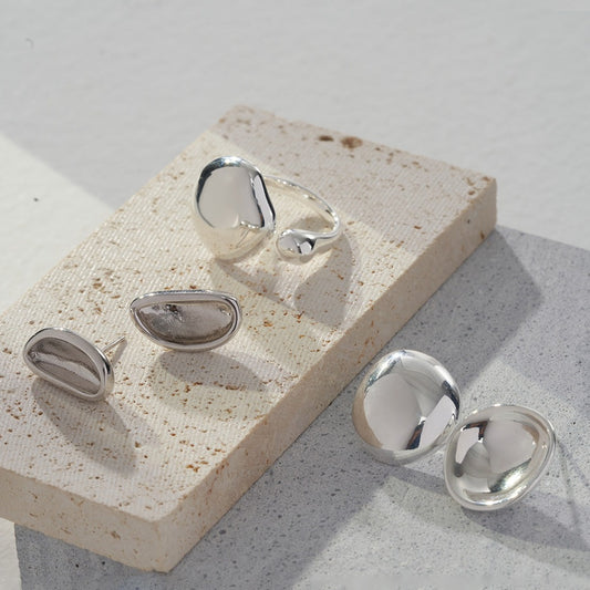 Pure silver asymmetric earring